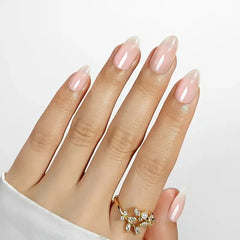 Elegant pink French tip nails with a glossy finish, showcasing a trendy hand design.